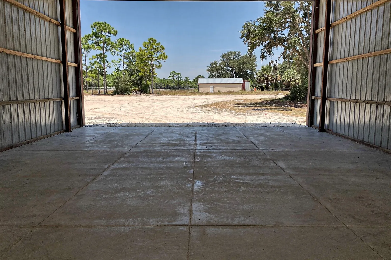 Saw-cut control joints in a finished pole barn concrete floor in Polk County